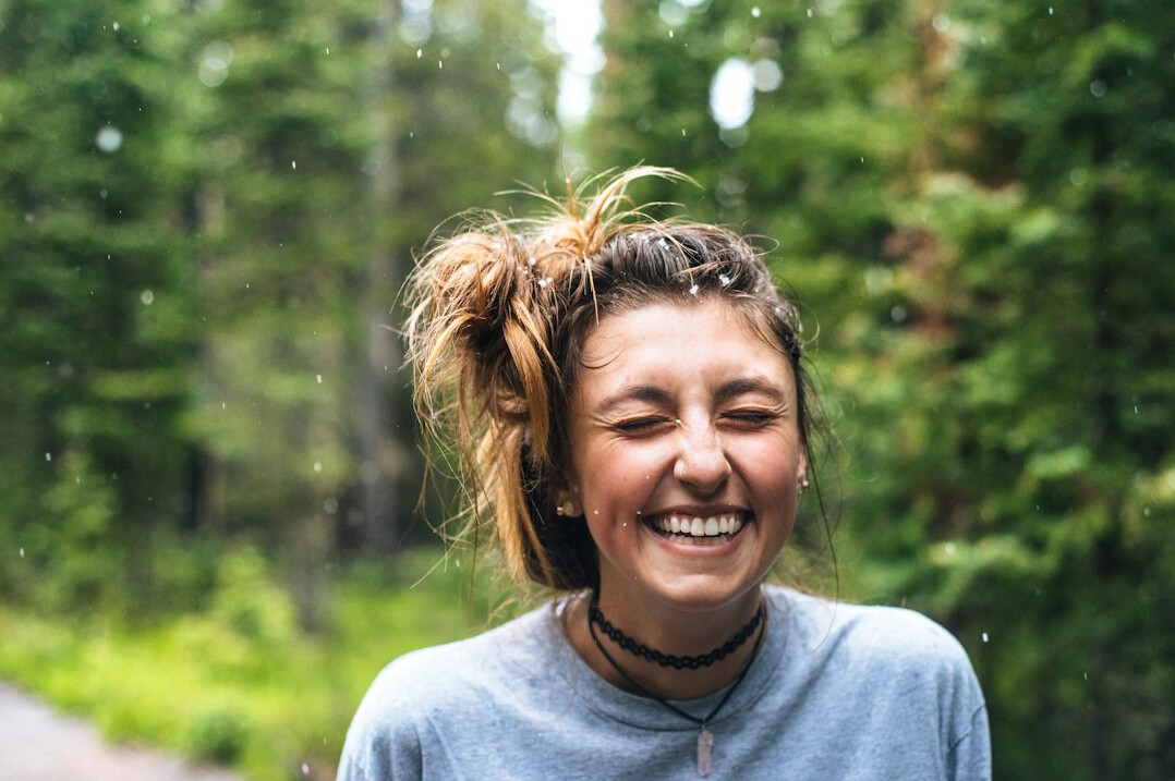person smiling confidently