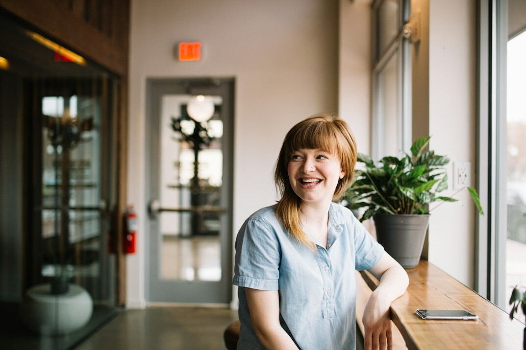 person smiling confidently