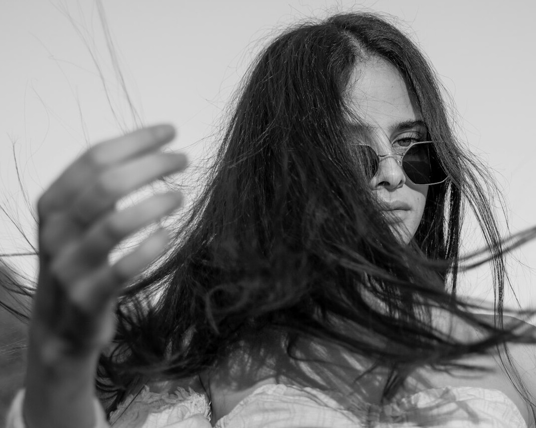 Smiling woman with long hair portrait