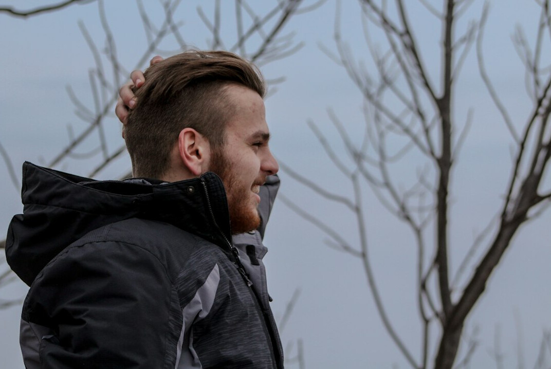 Smiling man with a short beard portrait